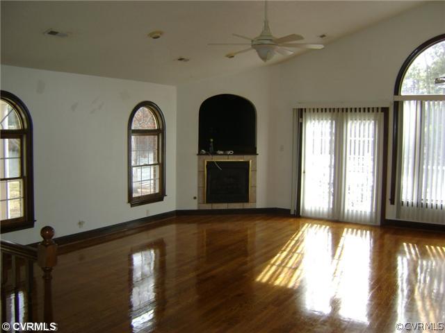 10306 Duncan Road Petersburg, VA 23803 - Photo 4 of 12 Living Room - Wood floors, gas fireplace, cathedr