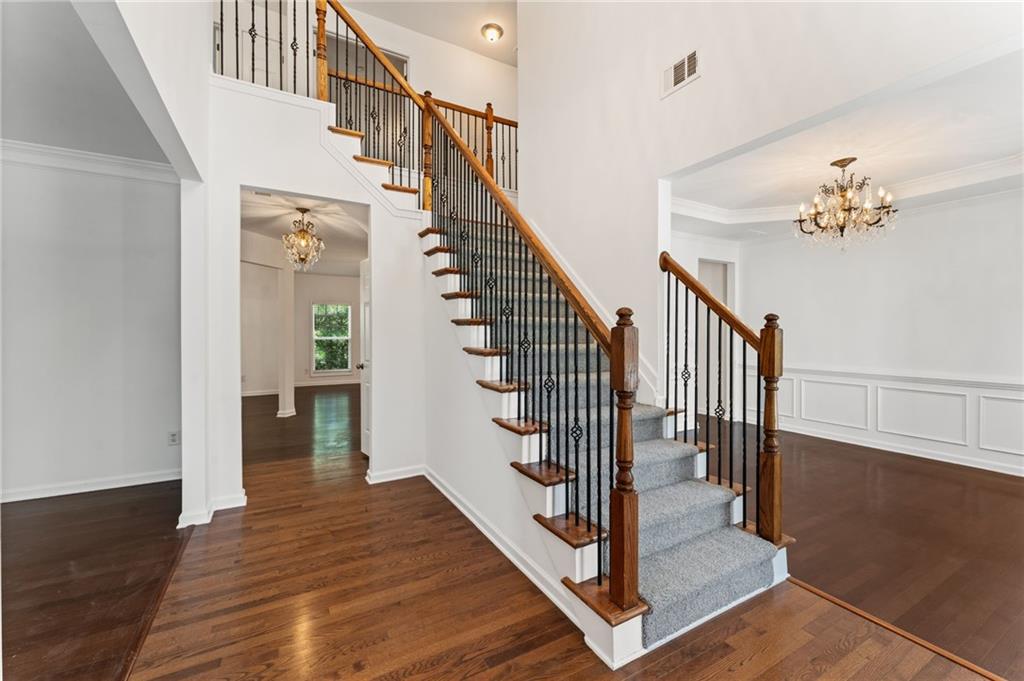 208 Sawtooth Court Canton, GA 30114 - Photo 4 of 31 a view of entryway and hall with wooden floor