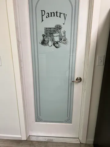 a room view with a floor to ceiling window and an outdoor view