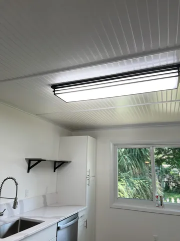 a white refrigerator freezer sitting in a kitchen