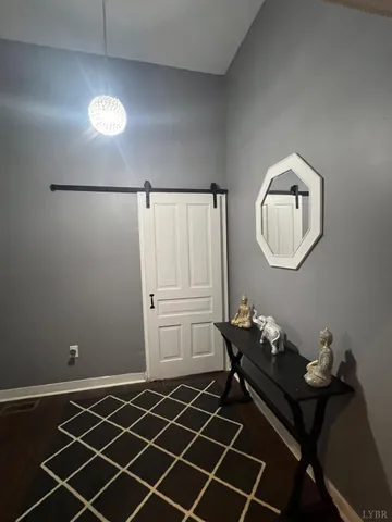 a room with furniture and a mirror