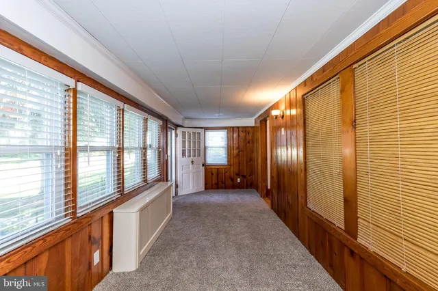 a view of a large room with windows