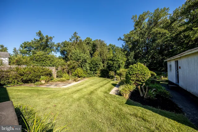 a view of a yard with an outdoor space