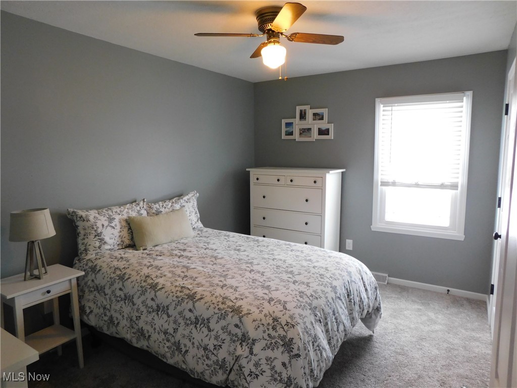 3273 Anglo Circle Northwest Canton, OH 44708 - Photo 23 of 33 Carpeted spare bedroom featuring ceiling fan