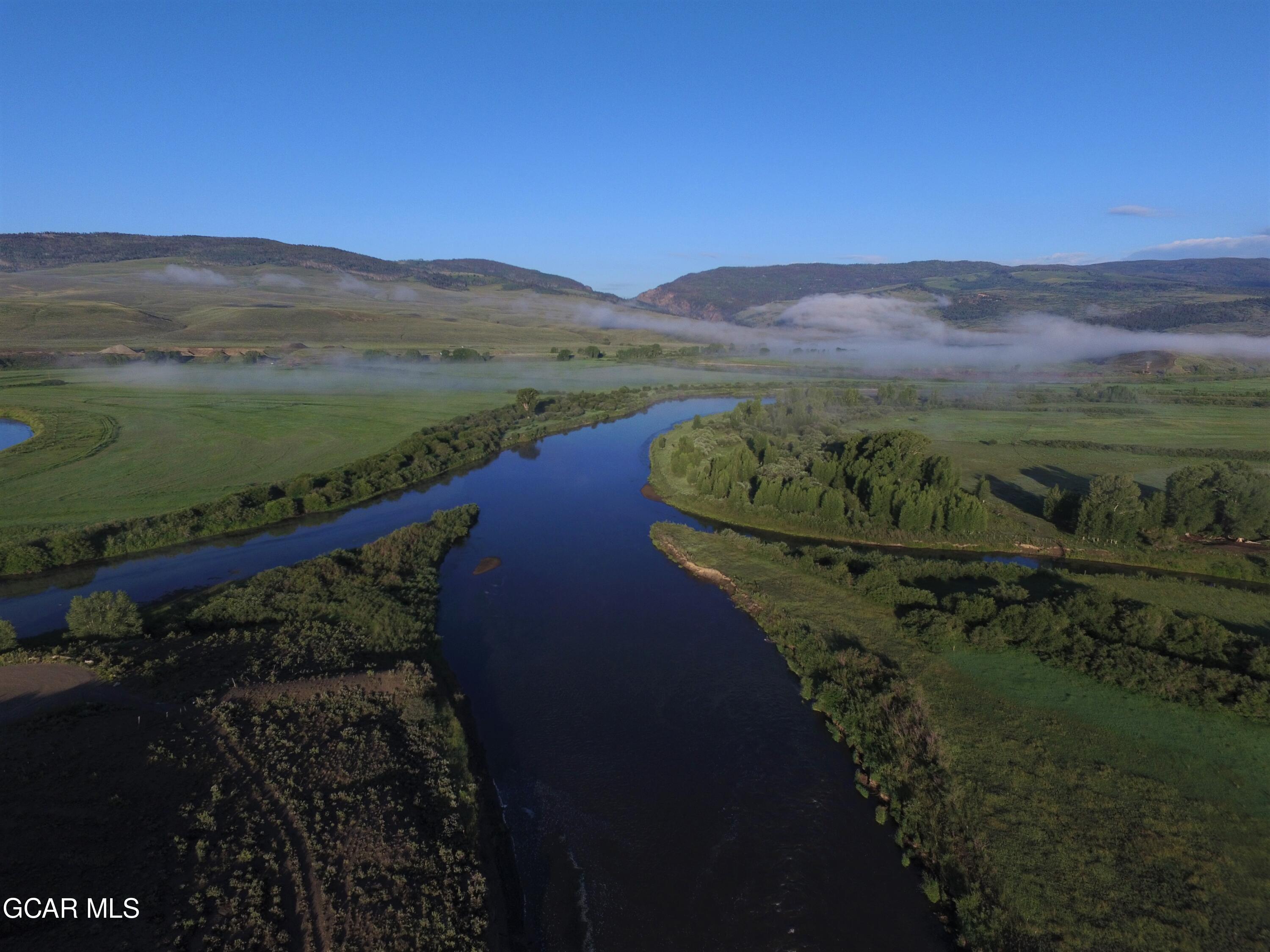 1921 Highway 9 Kremmling, CO 80459 - Photo 40 of 86 a view of a lake with a mountain in the background