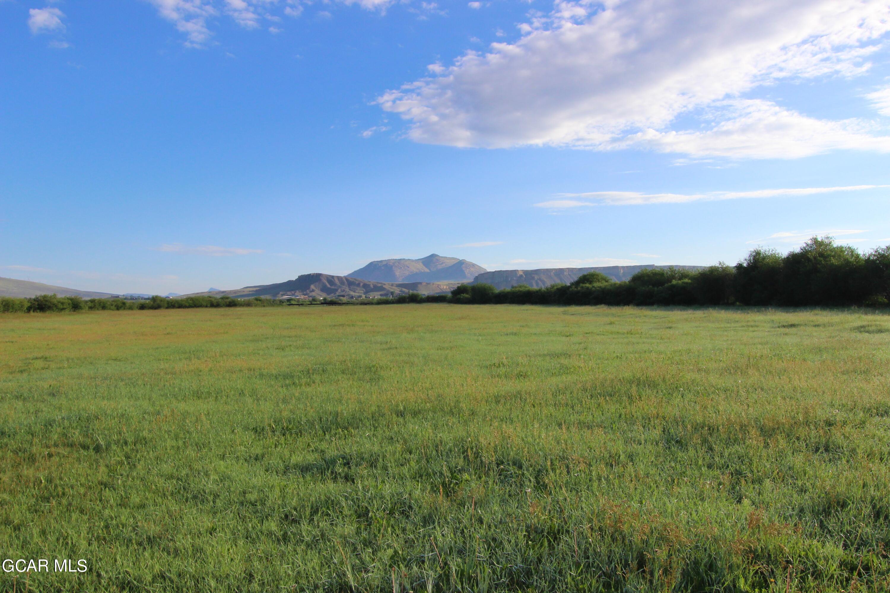 1921 Highway 9 Kremmling, CO 80459 - Photo 52 of 86 a view of a lake and a mountain in the background