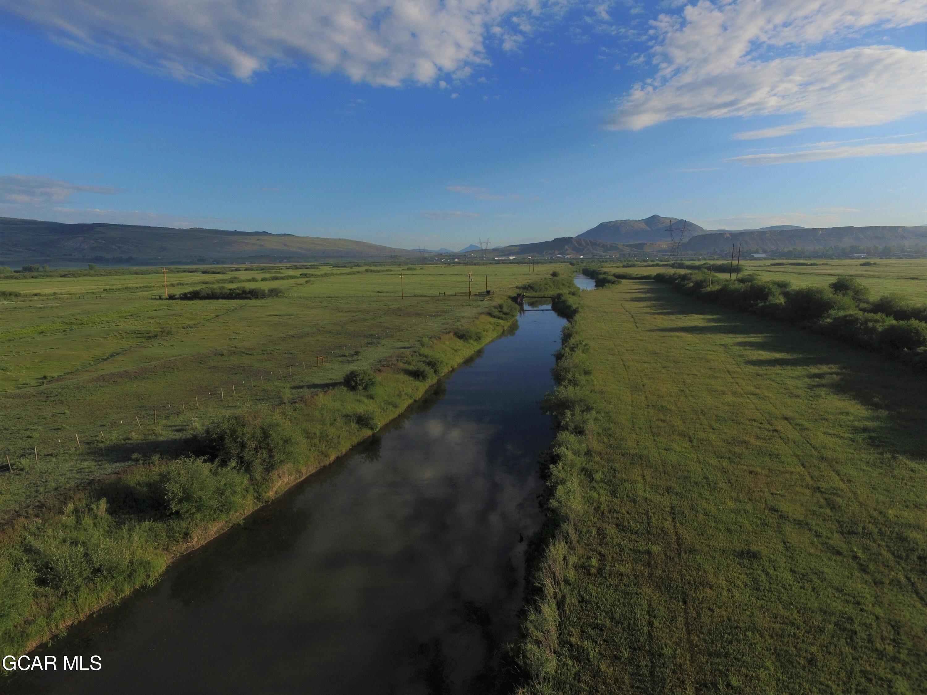 1921 Highway 9 Kremmling, CO 80459 - Photo 56 of 86 a view of a lake with a yard