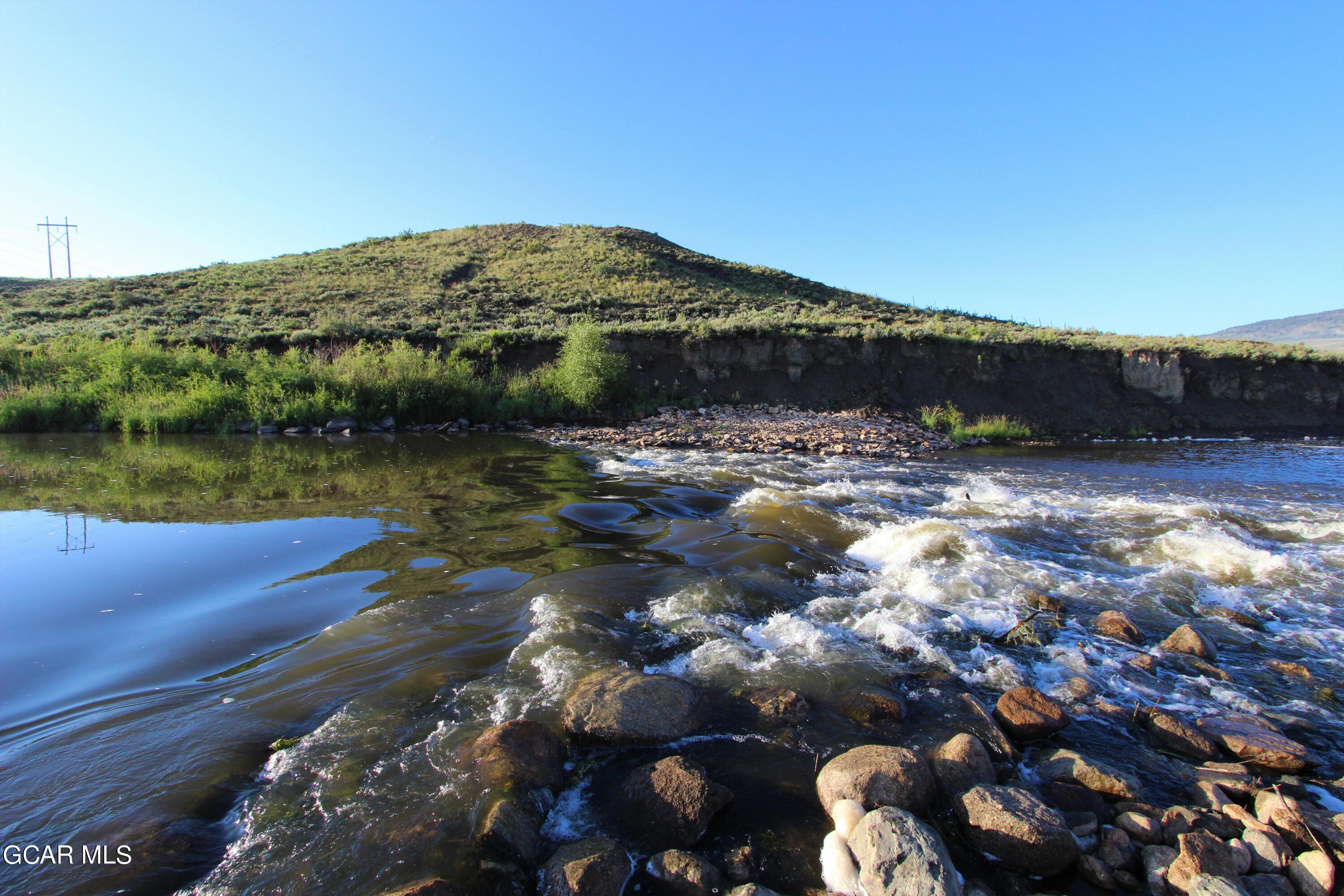 1921 Highway 9 Kremmling, CO 80459 - Photo 57 of 86 a view of a lake with a mountain
