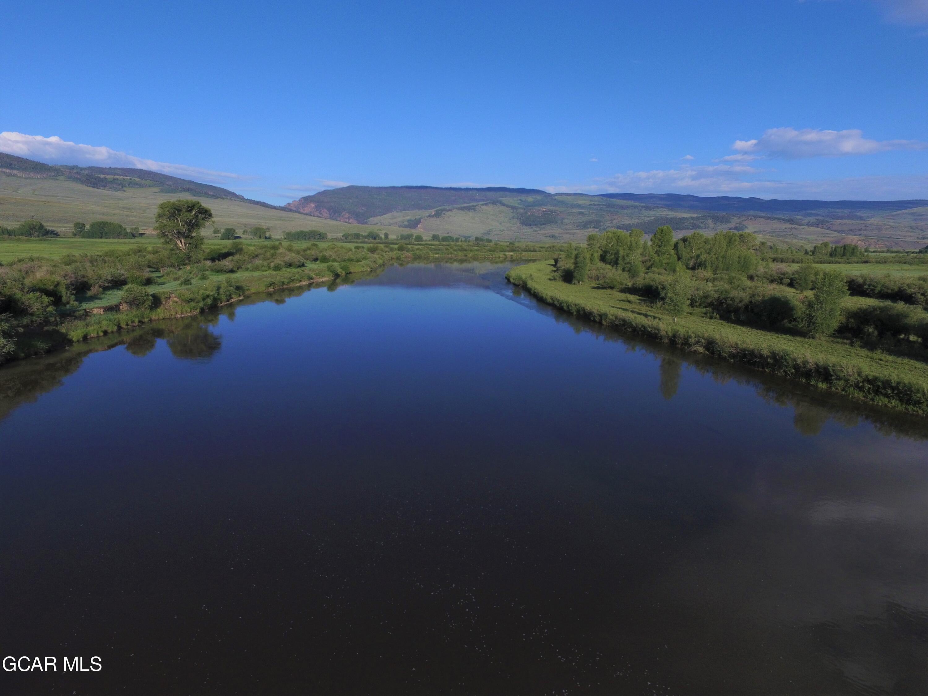 1921 Highway 9 Kremmling, CO 80459 - Photo 63 of 86 a view of a lake with mountains in the background