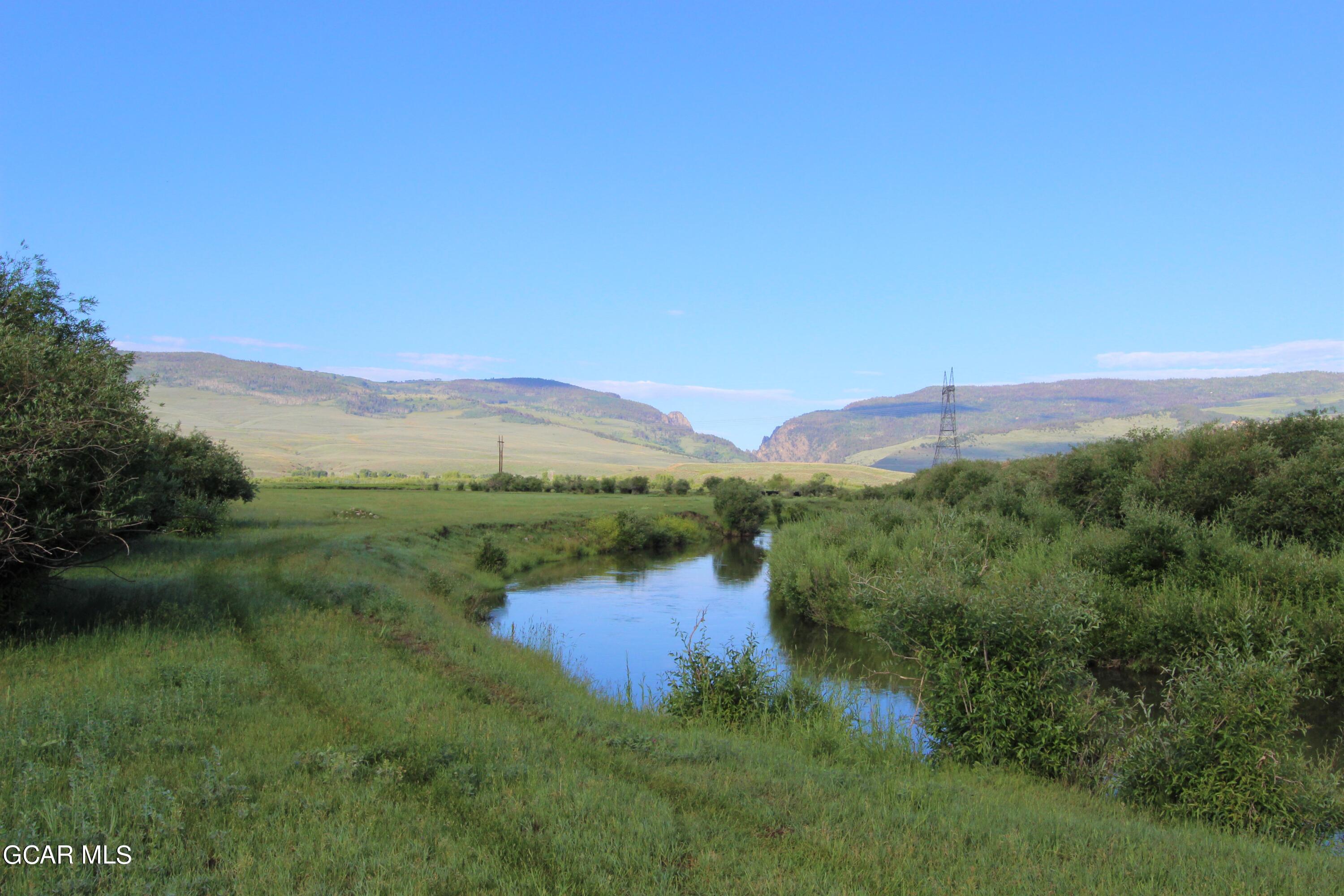 1921 Highway 9 Kremmling, CO 80459 - Photo 79 of 86 a view of a lake with a mountain in the background