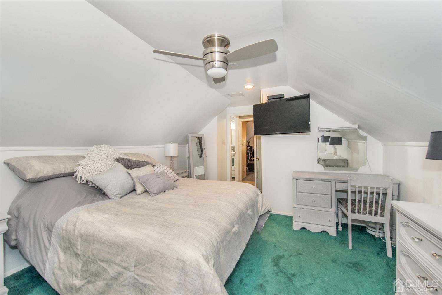 40 Longfellow Drive Colonia, NJ 07067 - Photo 14 of 24 a bedroom with a bed and a baby crib