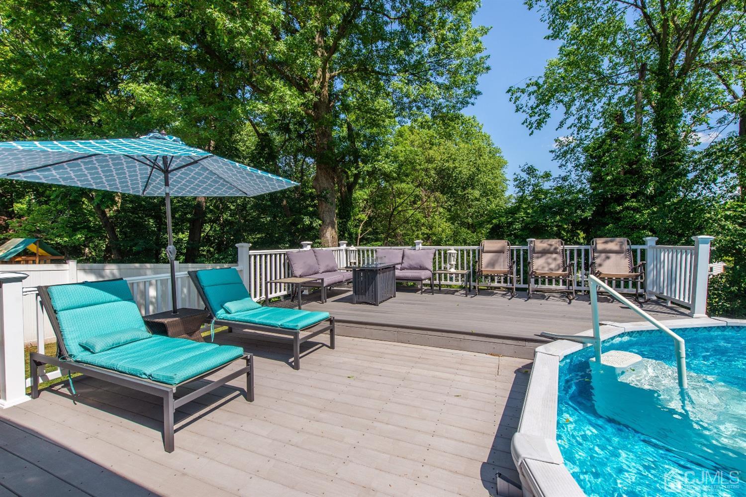 40 Longfellow Drive Colonia, NJ 07067 - Photo 21 of 24 swimming pool view with a seating space