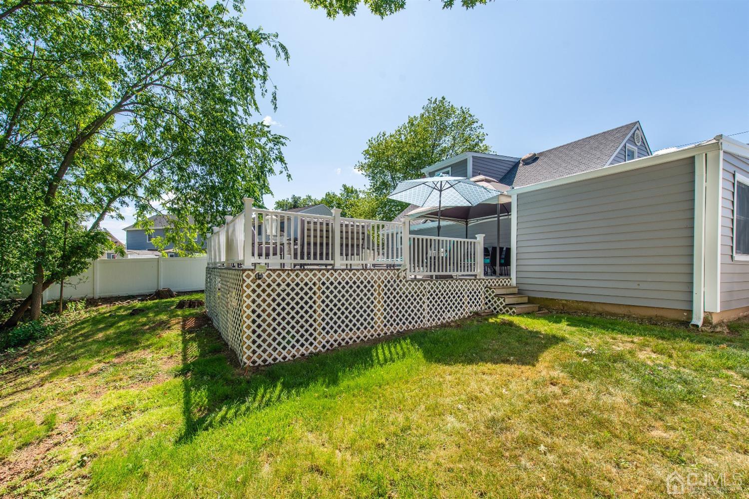 40 Longfellow Drive Colonia, NJ 07067 - Photo 23 of 24 a front view of a house having yard