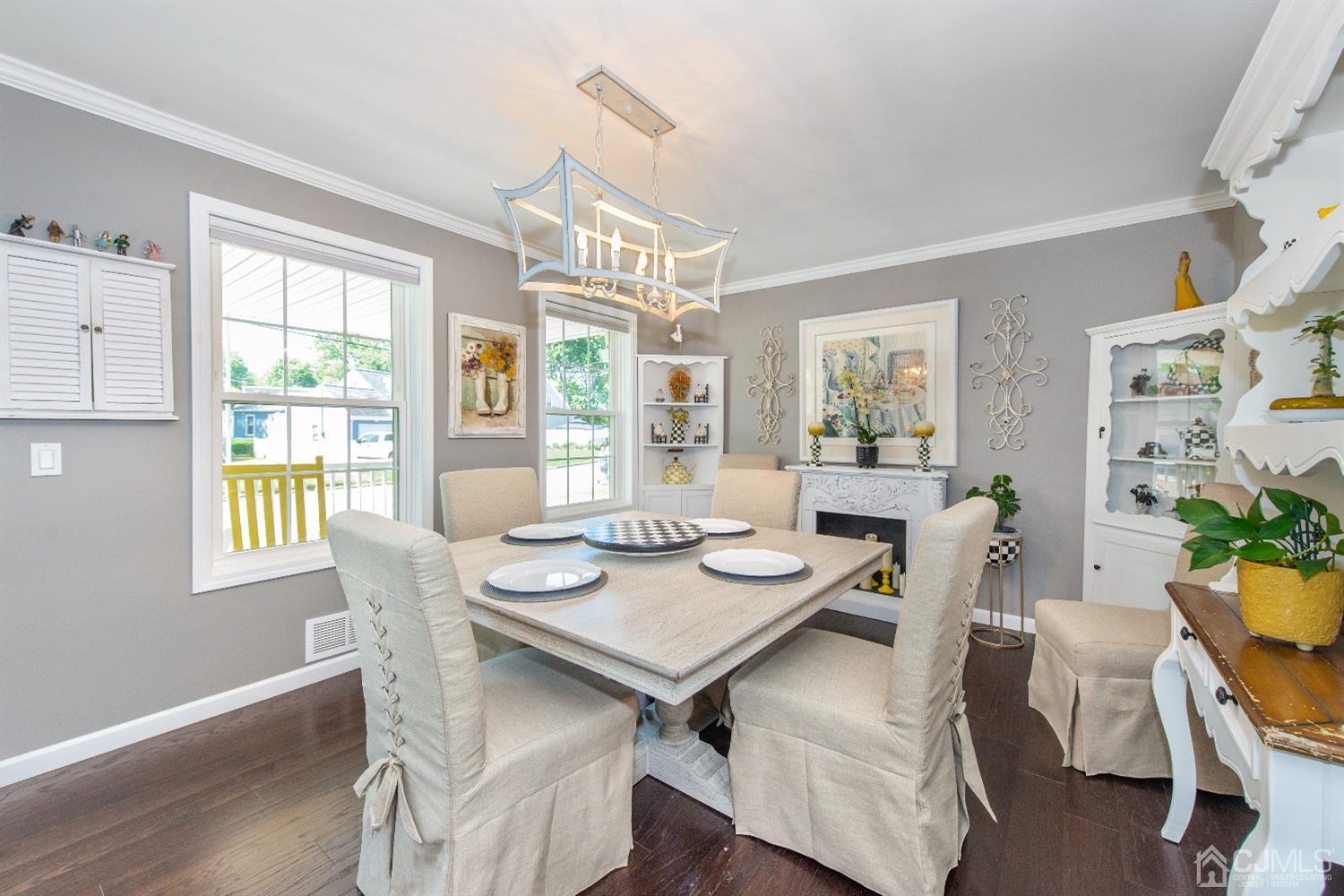 40 Longfellow Drive Colonia, NJ 07067 - Photo 5 of 24 a view of a dining room with furniture window and outside view