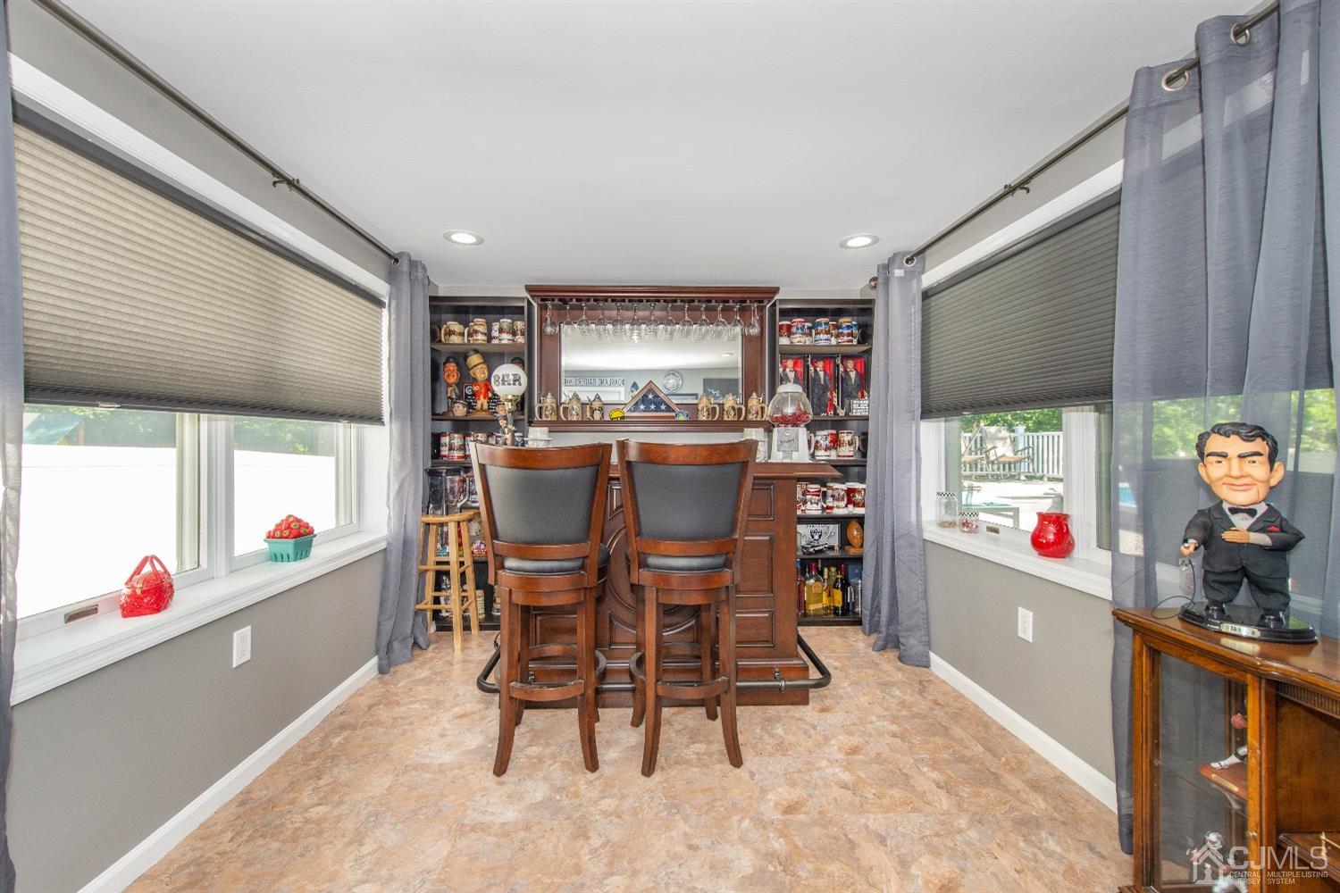 40 Longfellow Drive Colonia, NJ 07067 - Photo 9 of 24 a view of a dining room with furniture window and outside view