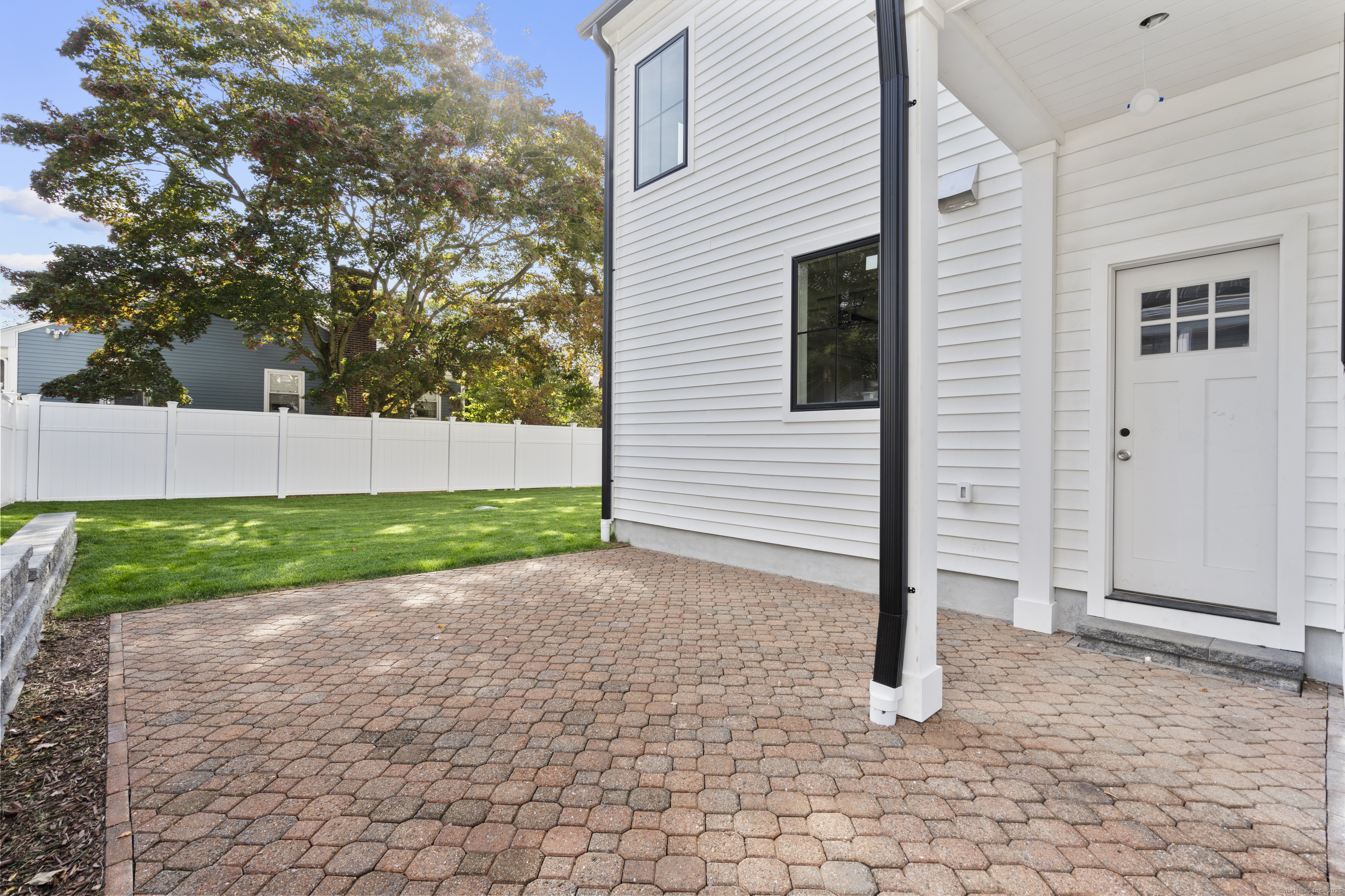 706 Judd Street Fairfield, CT 06824 - Photo 38 of 40 a view of a backyard with a garden