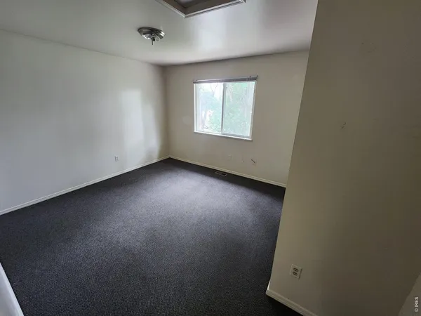 an empty room with a window