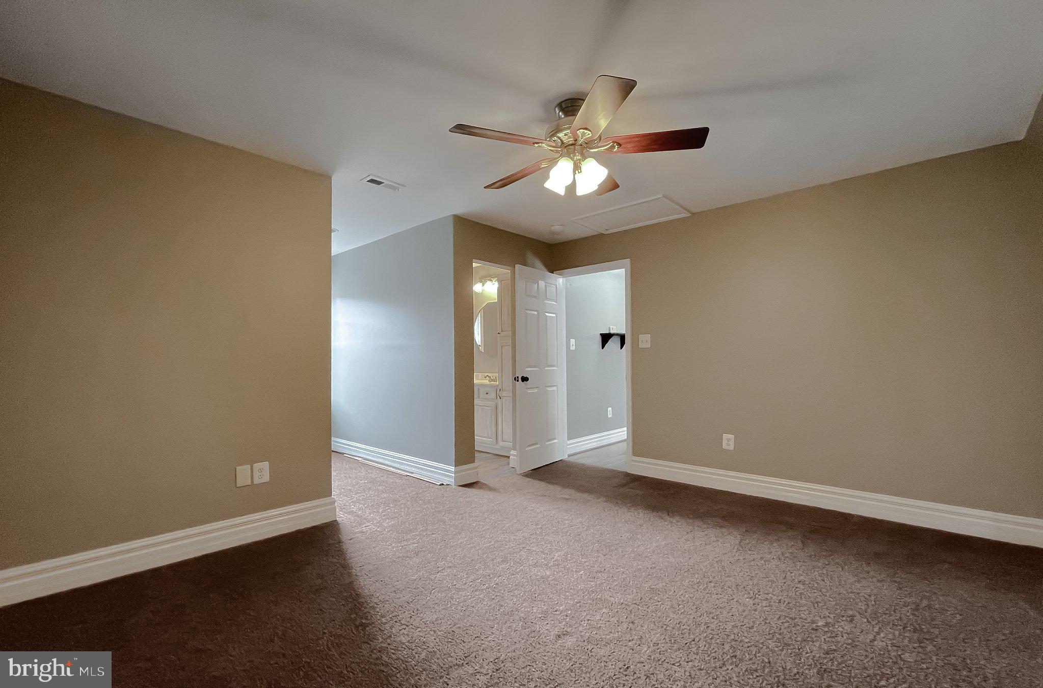 400 Adelina Road Prince Frederick, MD 20678 - Photo 24 of 57 Spacious room with cozy ambiance.