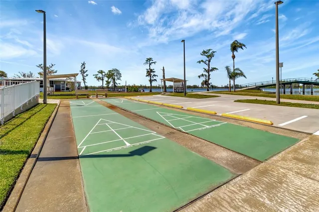 an aerial view of a house with a swimming pool
