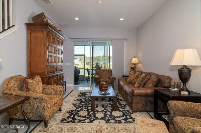 a living room with furniture and a couch