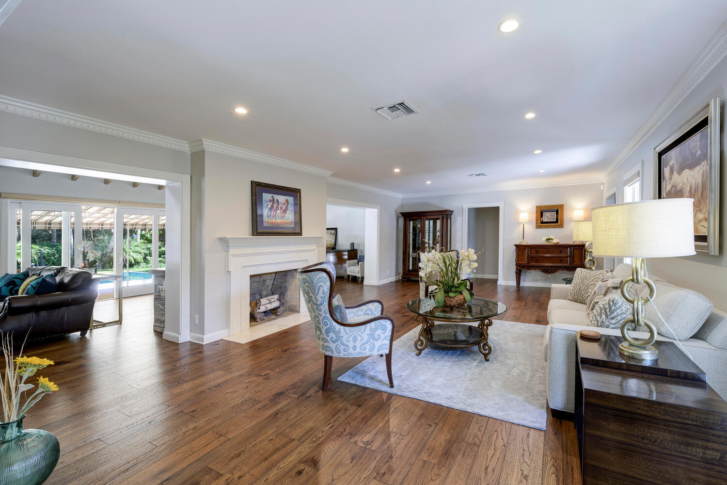 1125 Harbor Drive Delray Beach, FL 33483 - Photo 19 of 41 a living room with fireplace furniture and a wooden floor