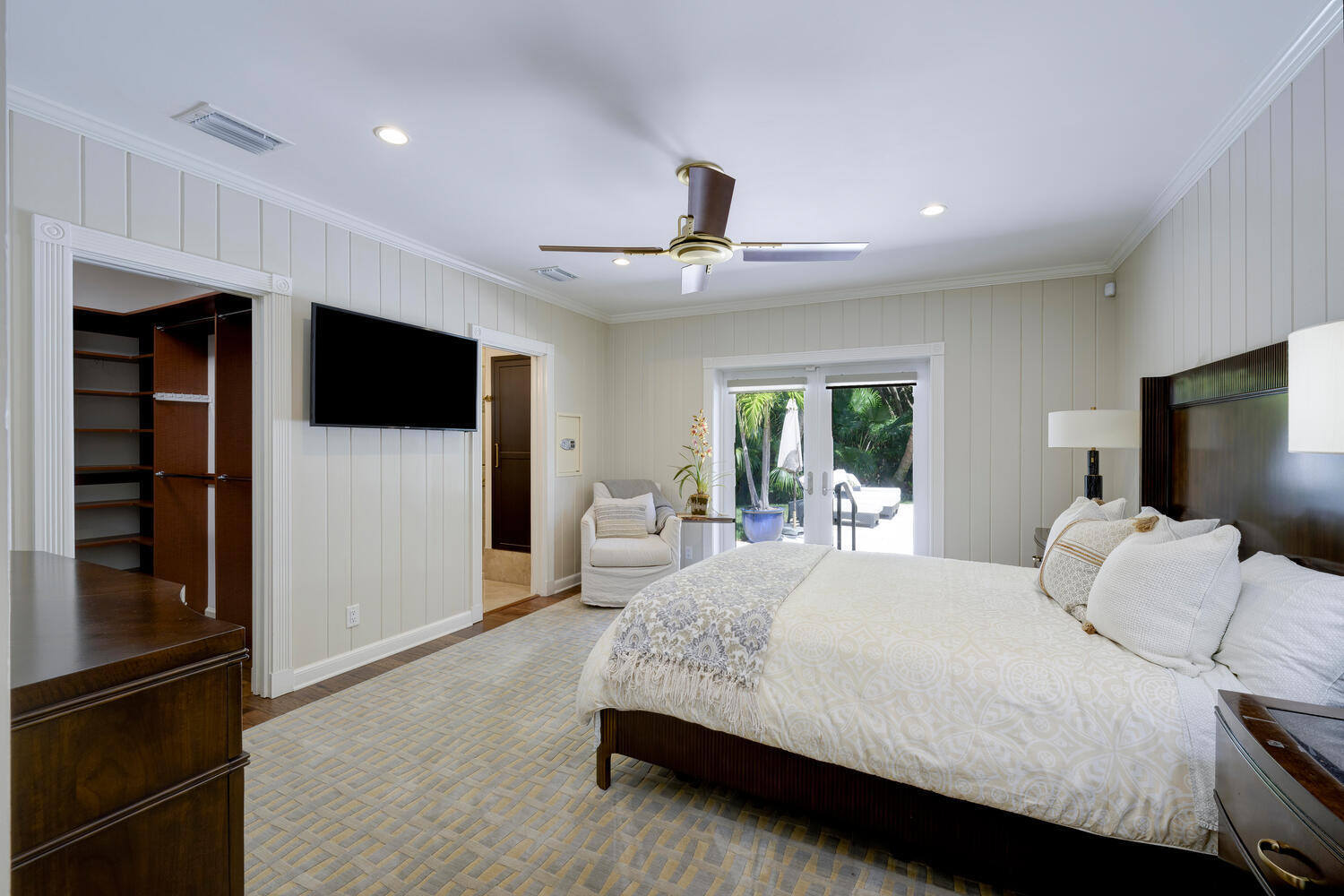 1125 Harbor Drive Delray Beach, FL 33483 - Photo 27 of 41 a bedroom with a bed and a flat screen tv