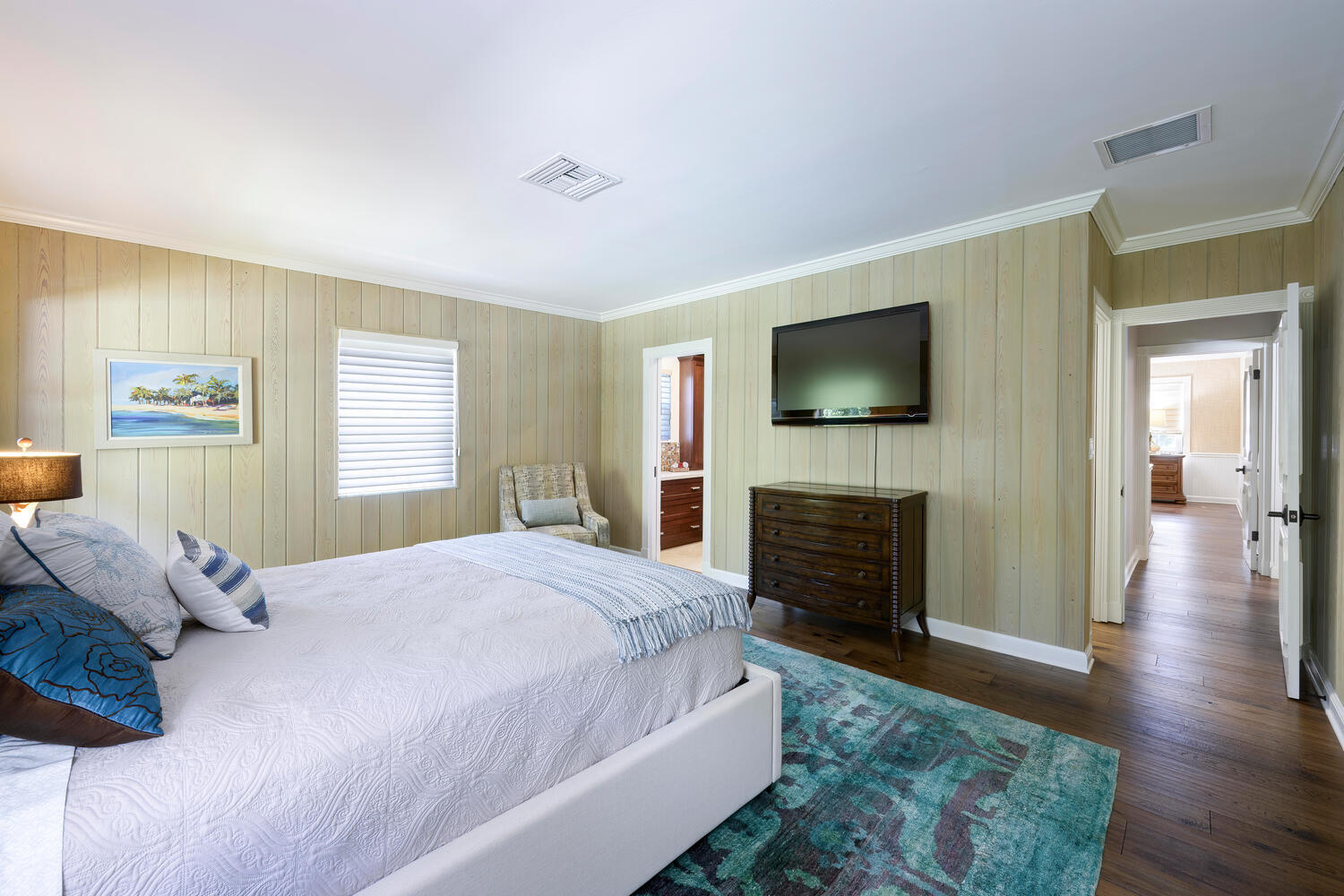 1125 Harbor Drive Delray Beach, FL 33483 - Photo 31 of 41 a spacious bedroom with a bed and a flat screen tv