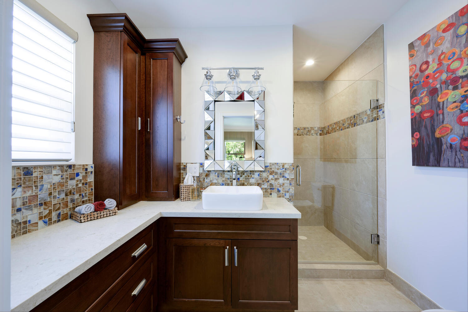 1125 Harbor Drive Delray Beach, FL 33483 - Photo 32 of 41 a bathroom with a sink a mirror and a shower