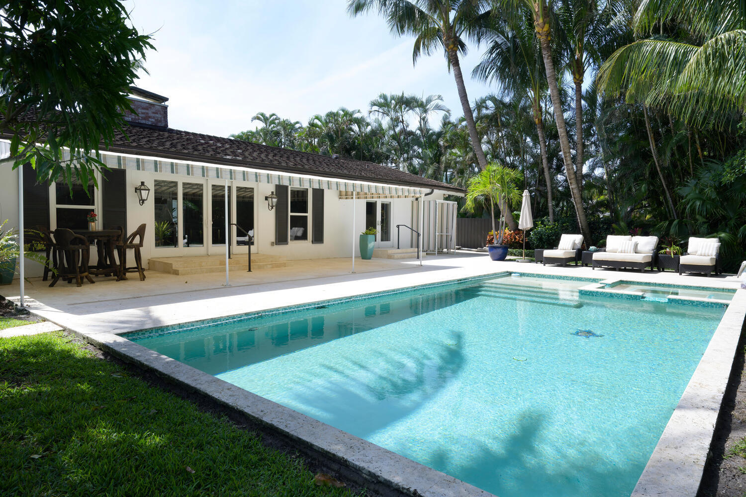1125 Harbor Drive Delray Beach, FL 33483 - Photo 39 of 41 a swimming pool with outdoor seating and yard