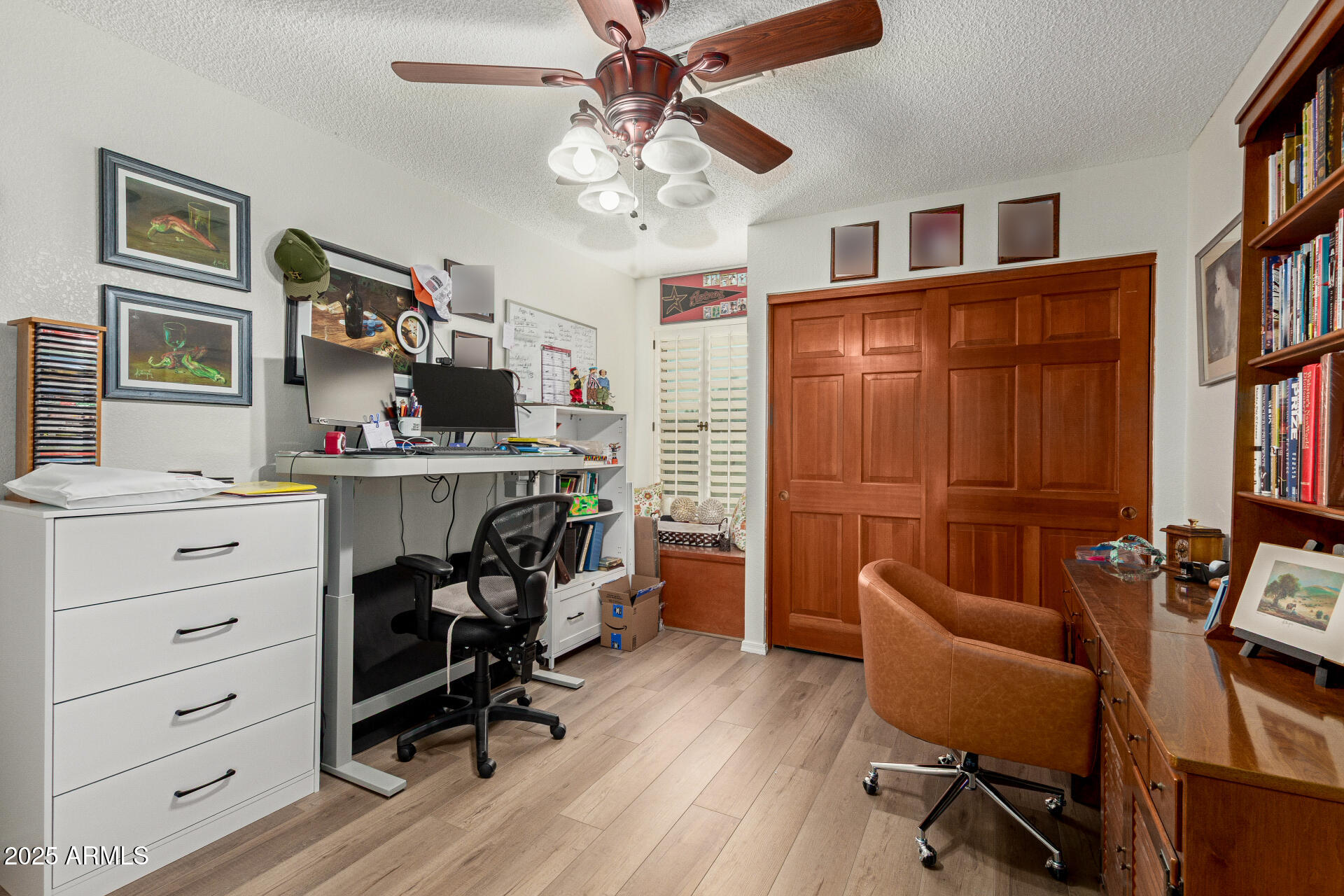 6231 West Grandview Road Glendale, AZ 85306 - Photo 21 of 35 a view of a workspace with furniture and a workspace