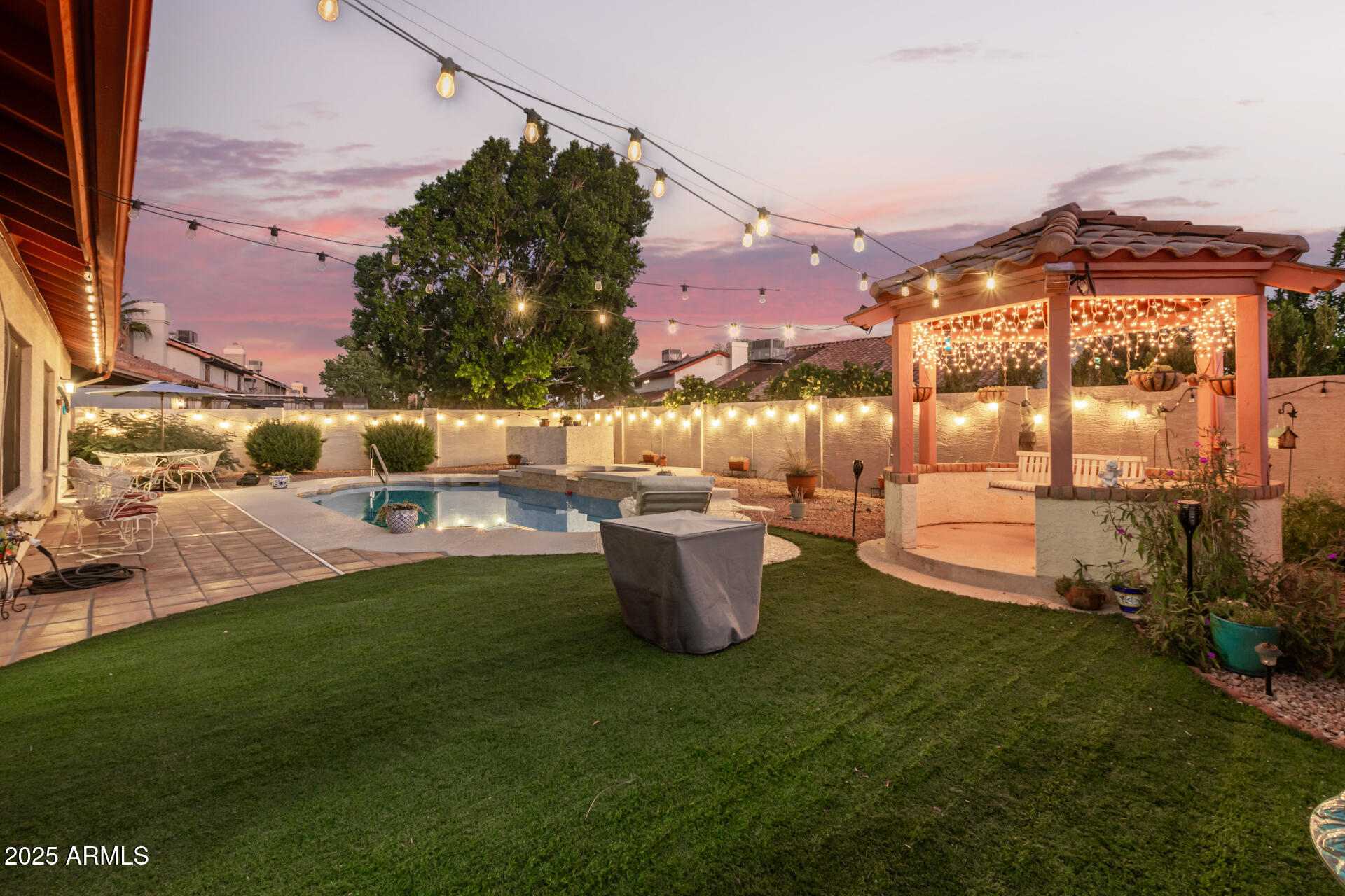 6231 West Grandview Road Glendale, AZ 85306 - Photo 24 of 35 a view of a backyard with sitting area