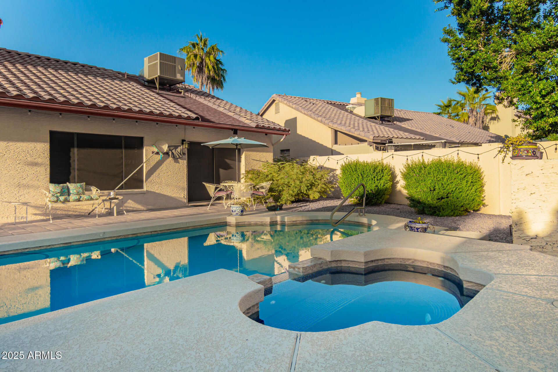 6231 West Grandview Road Glendale, AZ 85306 - Photo 27 of 35 a swimming pool with outdoor seating