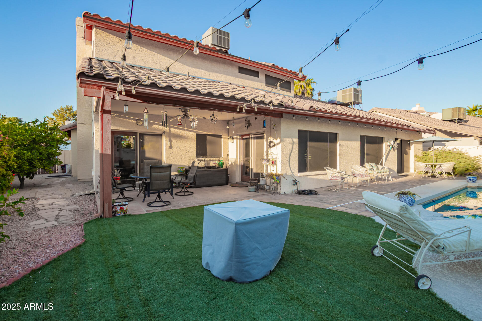 6231 West Grandview Road Glendale, AZ 85306 - Photo 29 of 35 a view of a house with pool porch and chairs