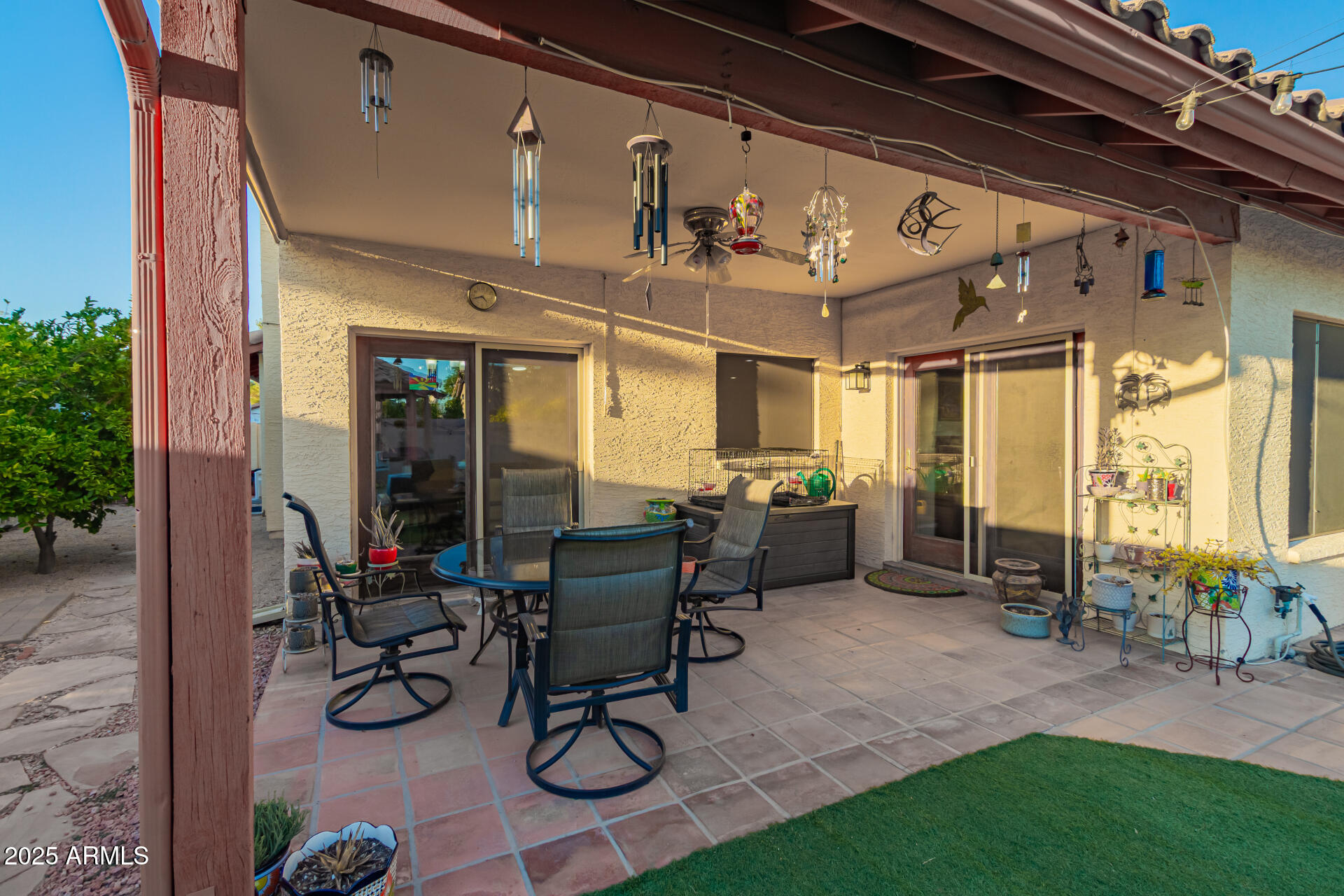 6231 West Grandview Road Glendale, AZ 85306 - Photo 30 of 35 a view of a patio with table and chairs