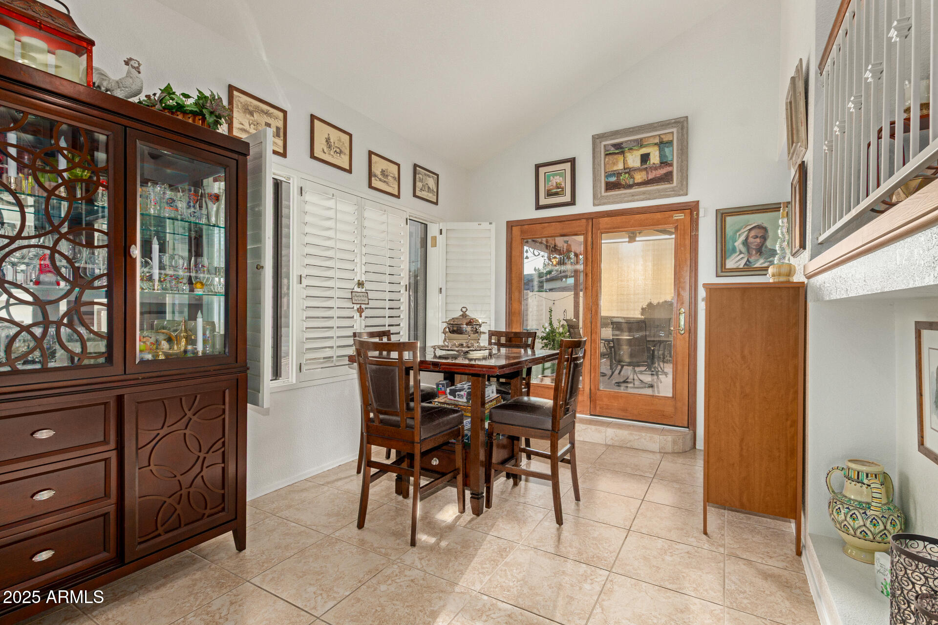 6231 West Grandview Road Glendale, AZ 85306 - Photo 10 of 35 a view of a dining room with furniture and window