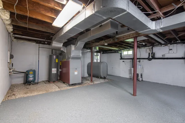 an empty room with fireplace