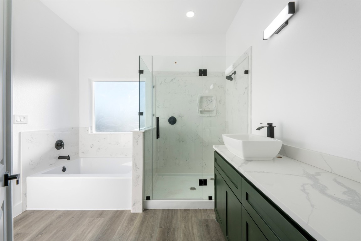1304 Duff Lane Houston, TX 77022 - Photo 20 of 33 a bathroom with a bathtub shower sink and toilet