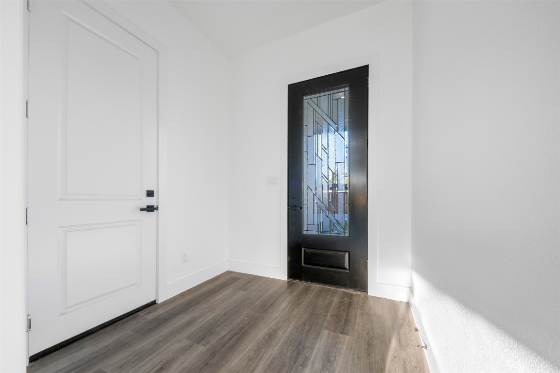 1304 Duff Lane Houston, TX 77022 - Photo 3 of 33 a view of an entryway with wooden floor