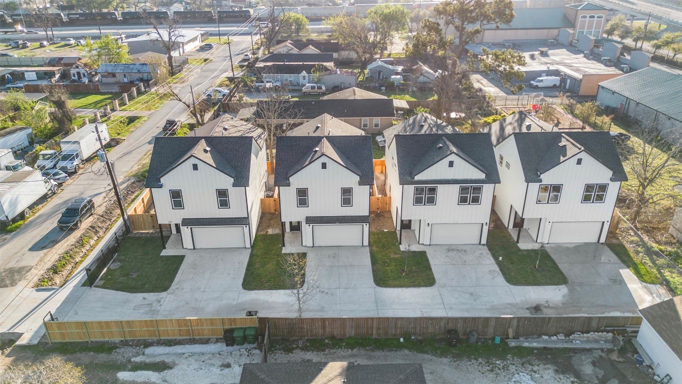 1304 Duff Lane Houston, TX 77022 - Photo 31 of 33 an aerial view of residential houses with outdoor space and parking