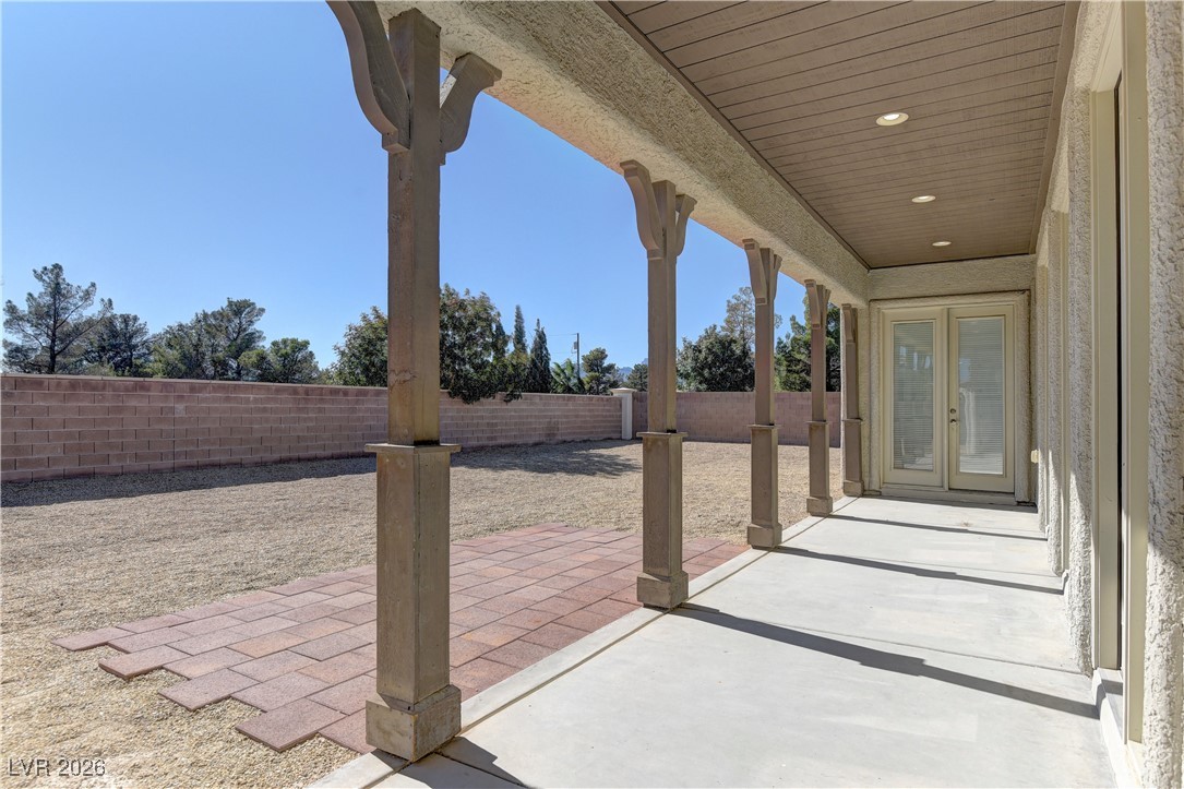 6383 Radiant Rapture Avenue Las Vegas, NV 89131 - Photo 16 of 17 Fenced backyard featuring a patio area
