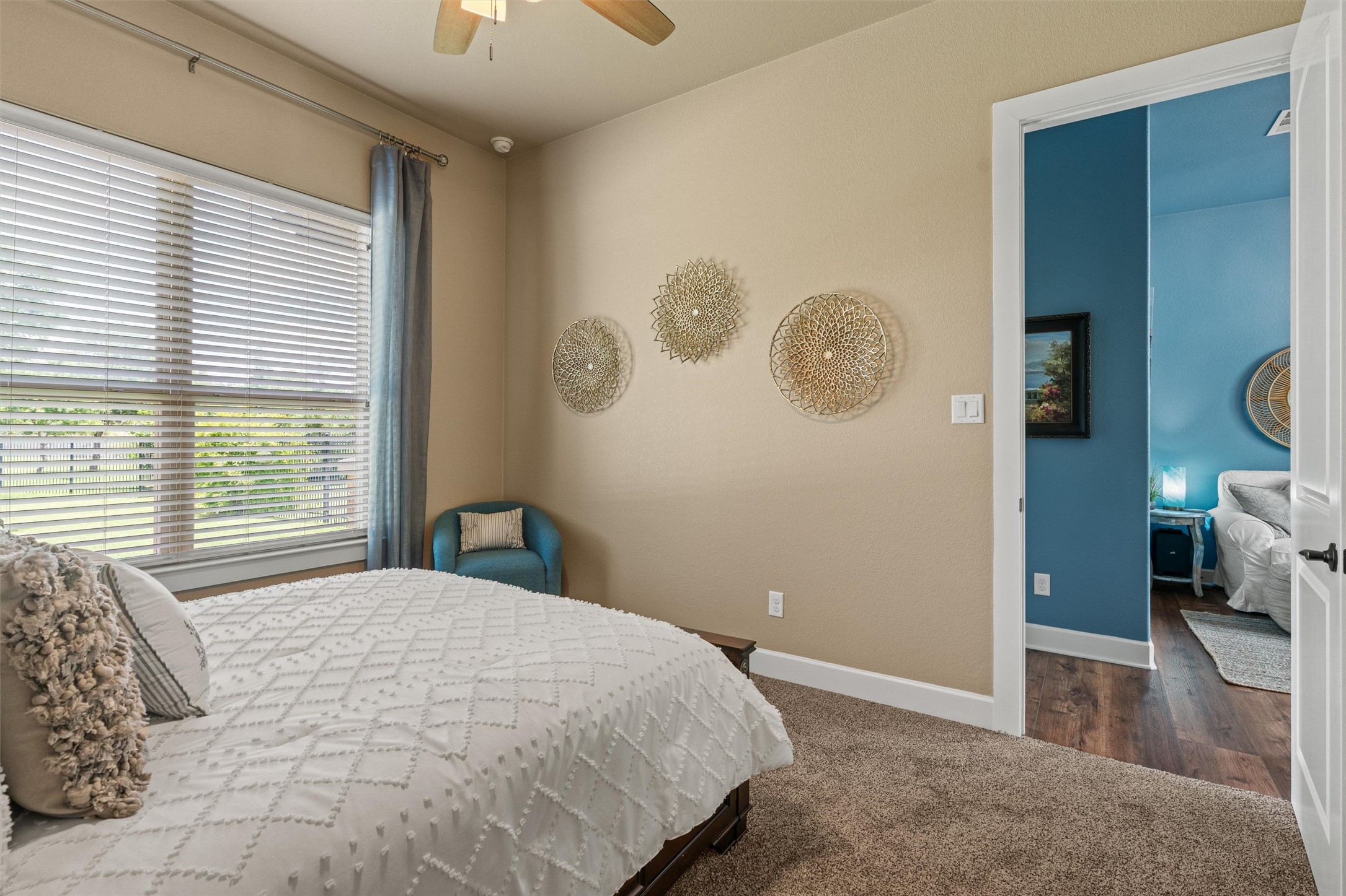104 Adobe Cove Georgetown, TX 78633 - Photo 20 of 39 Bedroom featuring dark carpet and ceiling fan