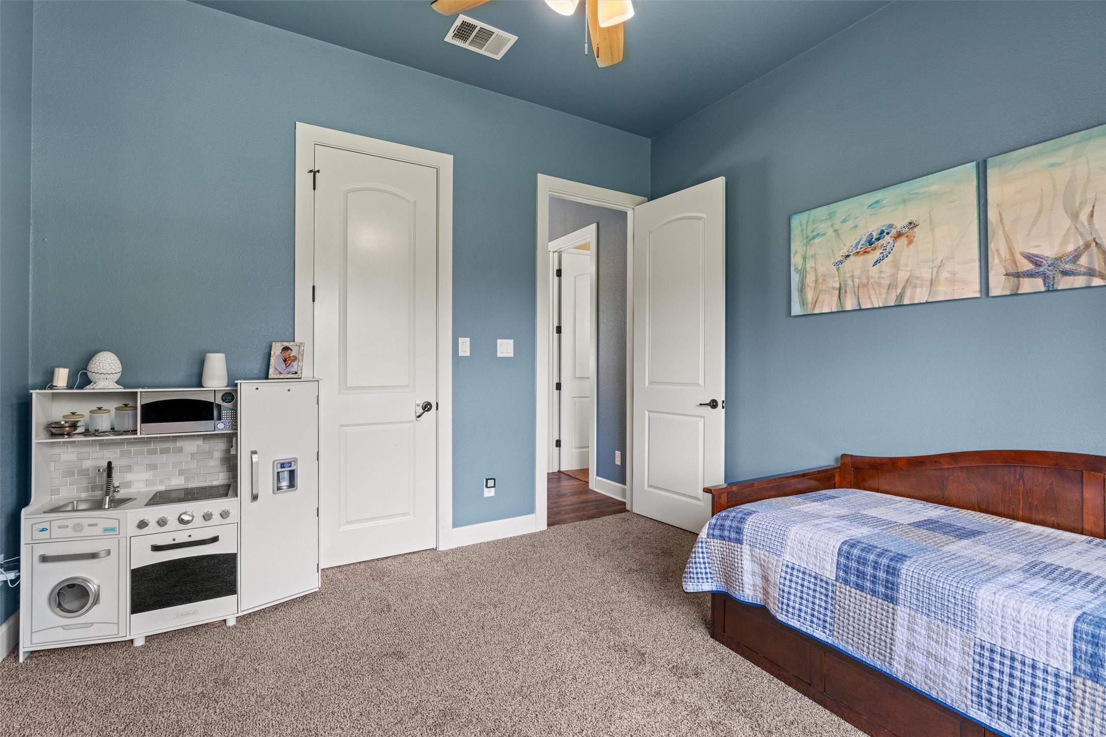 104 Adobe Cove Georgetown, TX 78633 - Photo 21 of 39 Carpeted bedroom with baseboards