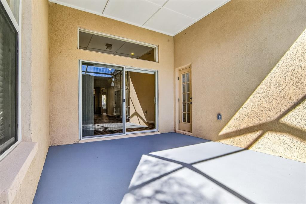 6002 Martinglade Place Lithia, FL 33547 - Photo 46 of 62 a view of an empty room and wooden floor