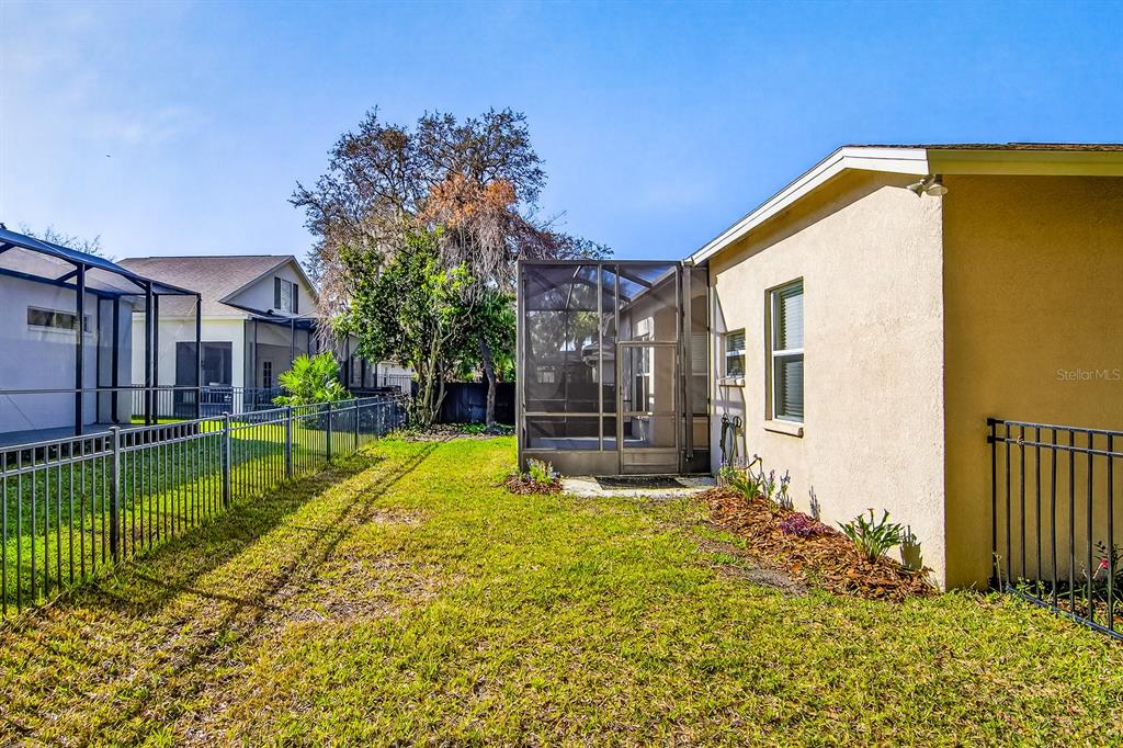 6002 Martinglade Place Lithia, FL 33547 - Photo 49 of 62 a view of swimming pool with a house in the background