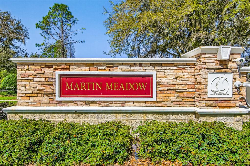6002 Martinglade Place Lithia, FL 33547 - Photo 54 of 62 a view of a red sign on the side of a building