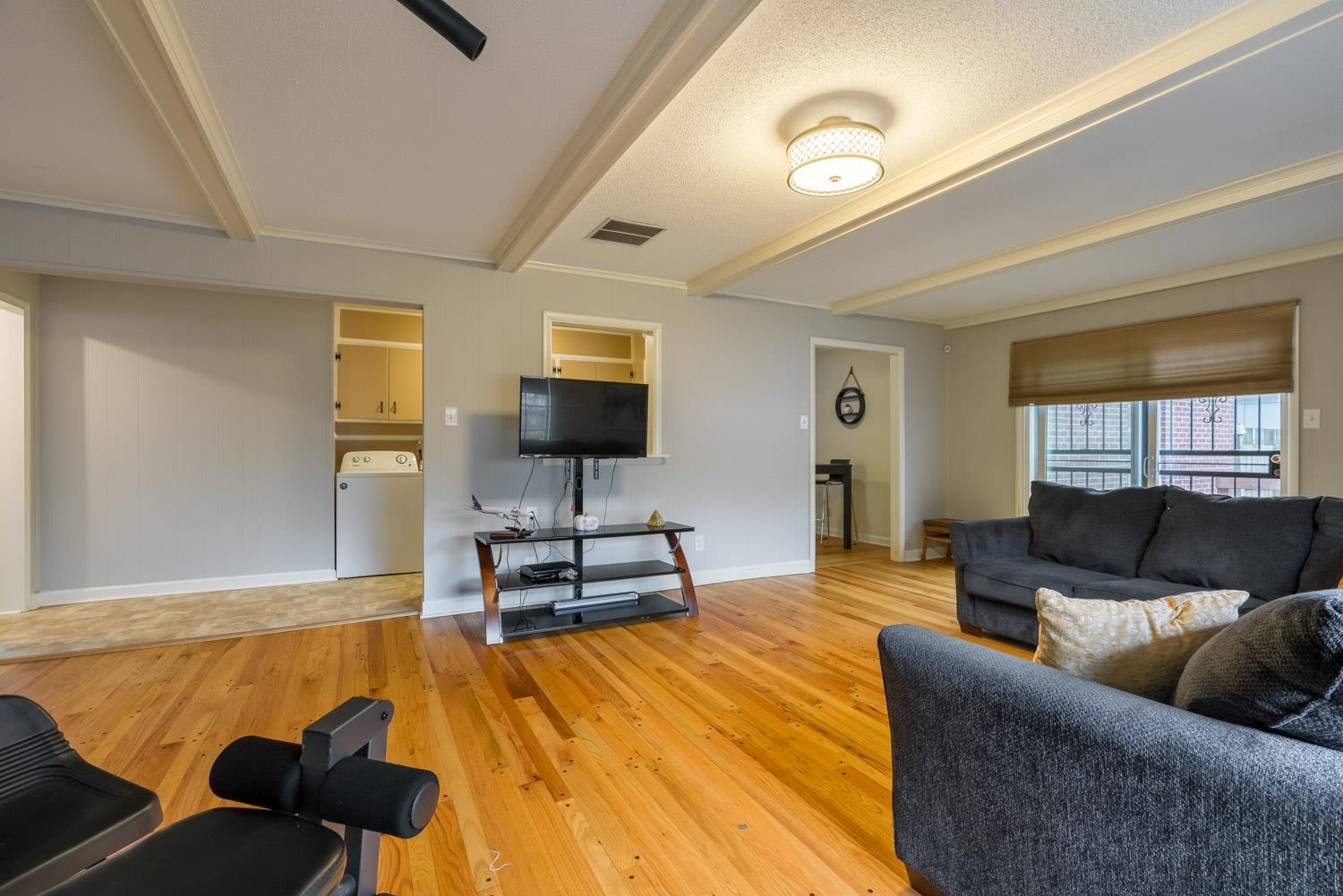 4500 Helene Road Memphis, TN 38117 - Photo 15 of 25 a living room with furniture and a flat screen tv