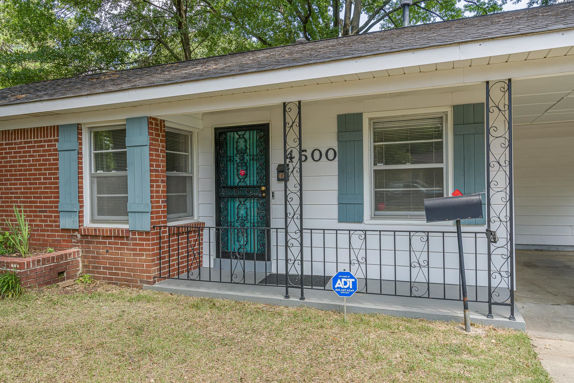 4500 Helene Road Memphis, TN 38117 - Photo 2 of 25 a front view of a house with a garage