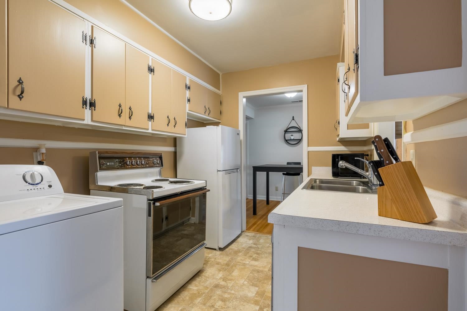4500 Helene Road Memphis, TN 38117 - Photo 9 of 25 a kitchen with a stove and a sink