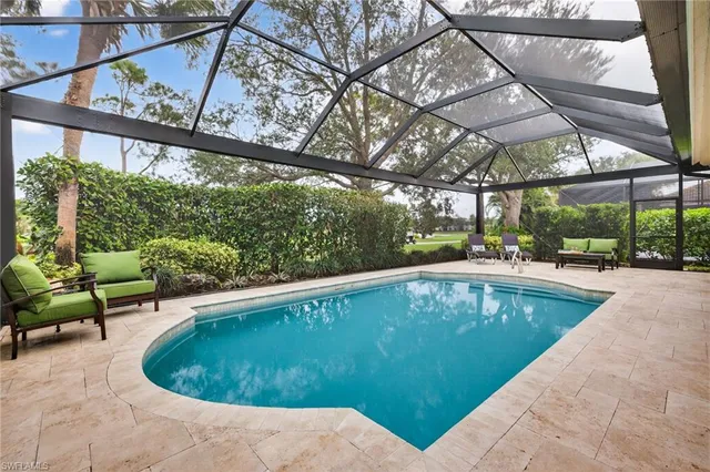 a view of a swimming pool with a patio