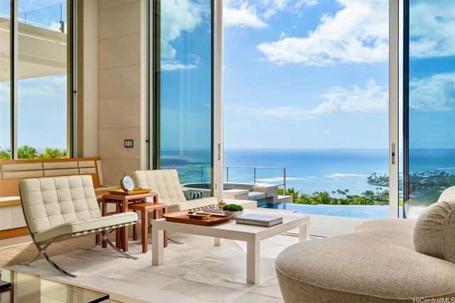 a living room with patio furniture